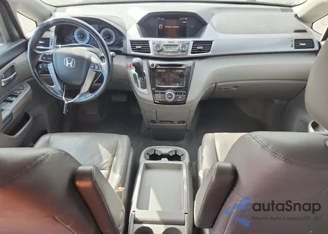 2014 Honda Odyssey Exl z USA, uszkodzony, nr VIN 5FNRL5H69EB120781